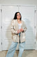 Tan cardigan sweater with white stars